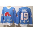 Men's Quebec Nordiques #19 Joe Sakic Light Blue Throwback Jersey